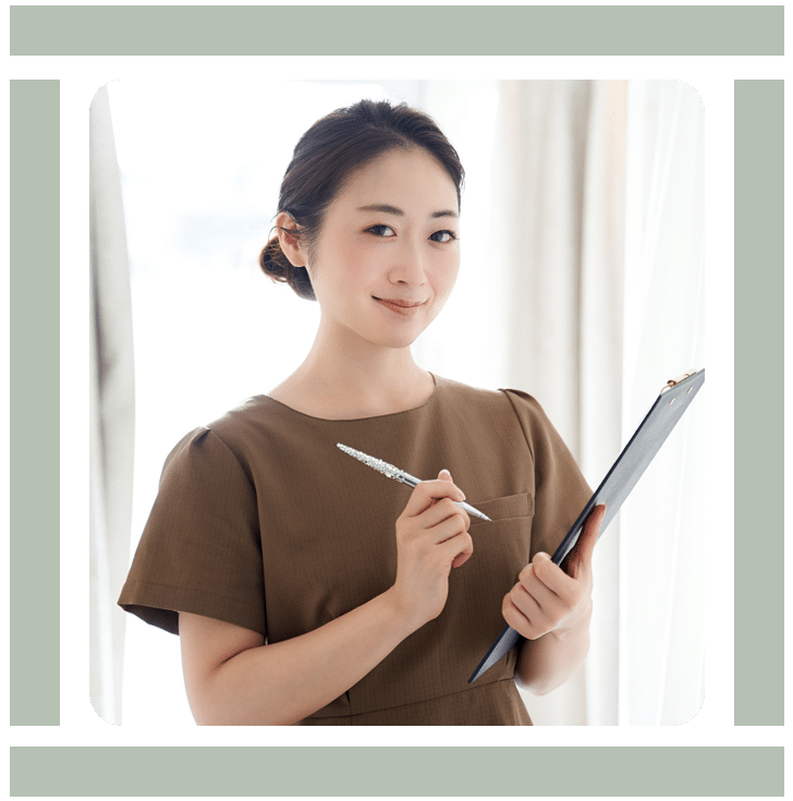A woman writing on a notepad